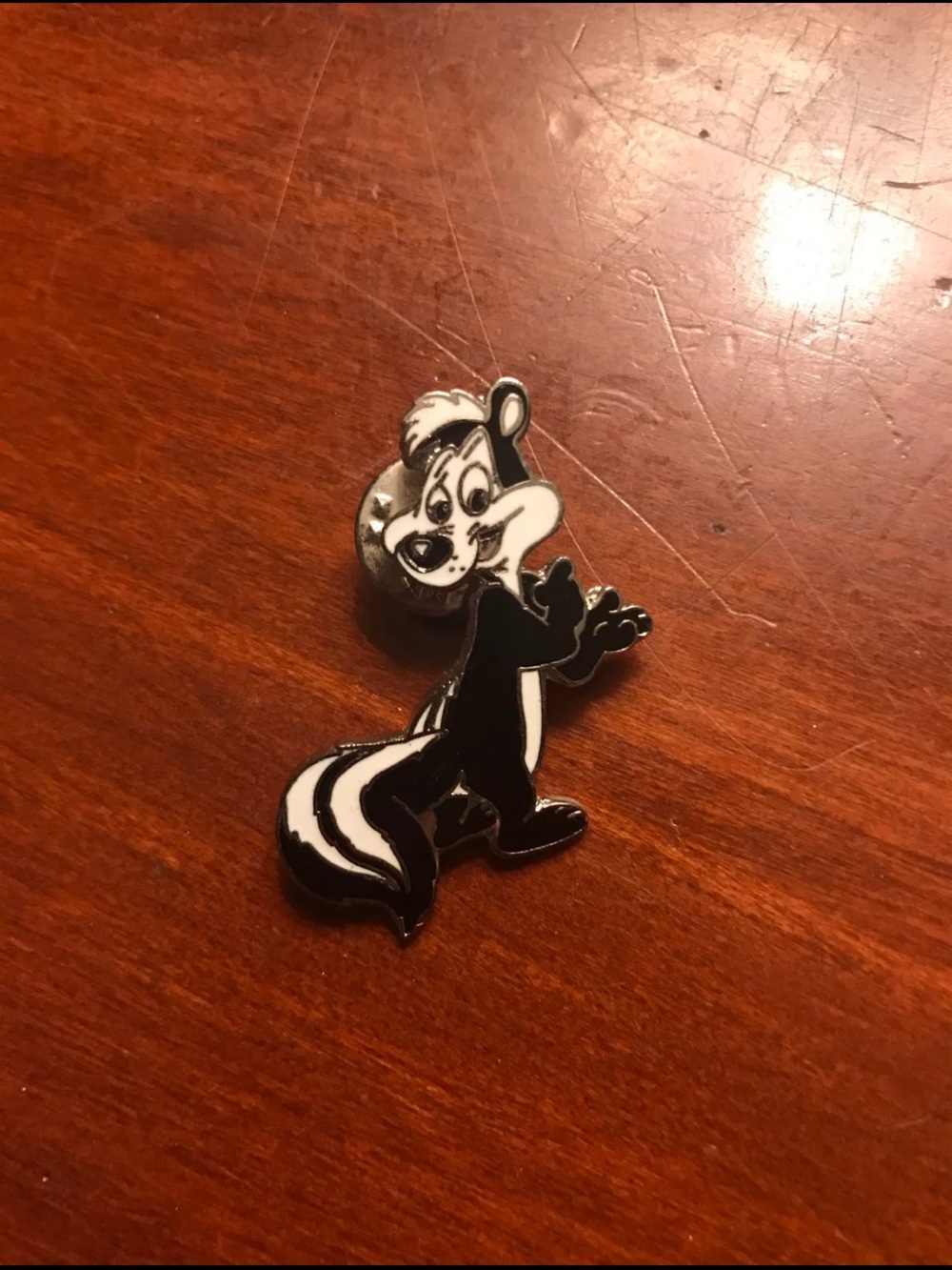 Vintage Warner Bros. Black and White Skunk Enamel Pet Charm